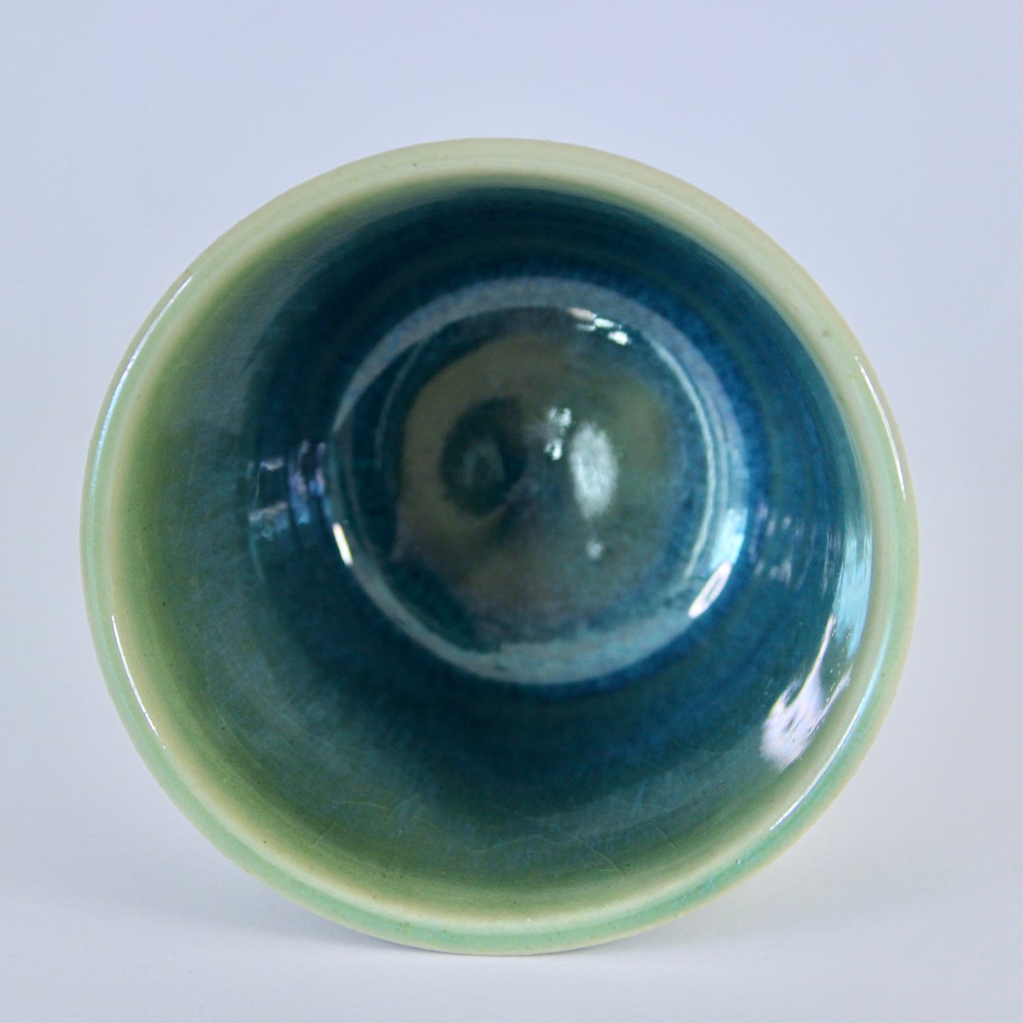 Koffiekopje zonder oor, groen/turquoise met wit spikkel