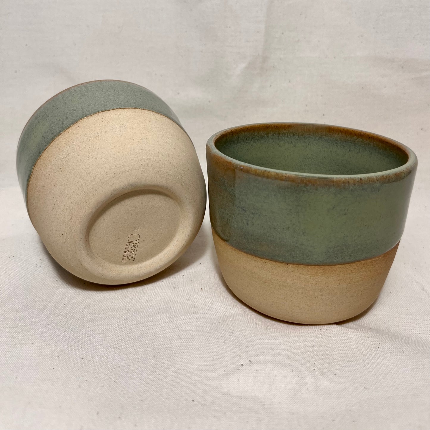 Koffiekop celadon met lichte klei