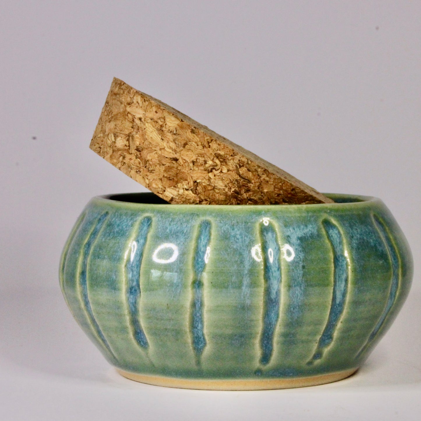 Voorraadpotje strepen turquoise met bondel